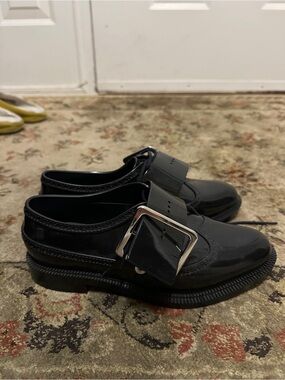 Melissa Black Jelly Loafers with Silver Buckle Detail